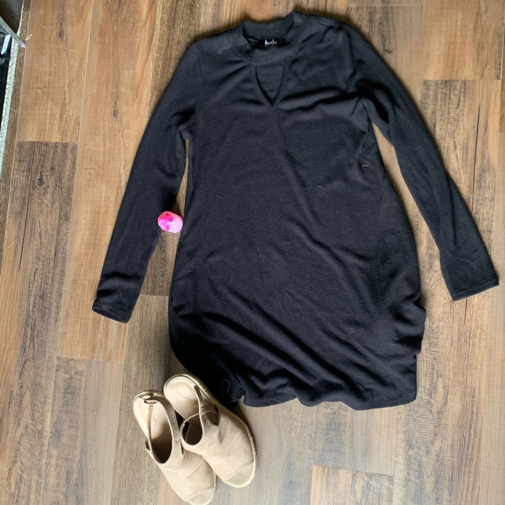 Black long sleeve midi dress.